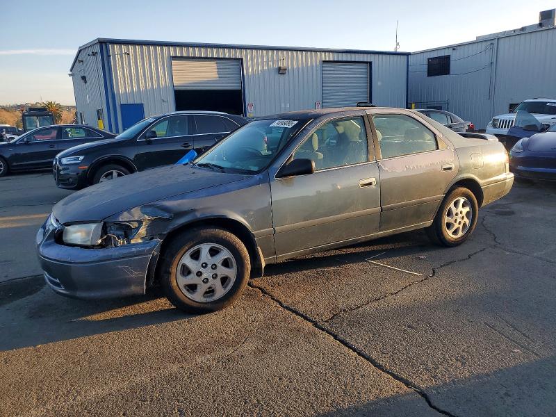TOYOTA CAMRY CE 2000 with VIN JT2BG22K8Y0389554 - Photo from auction