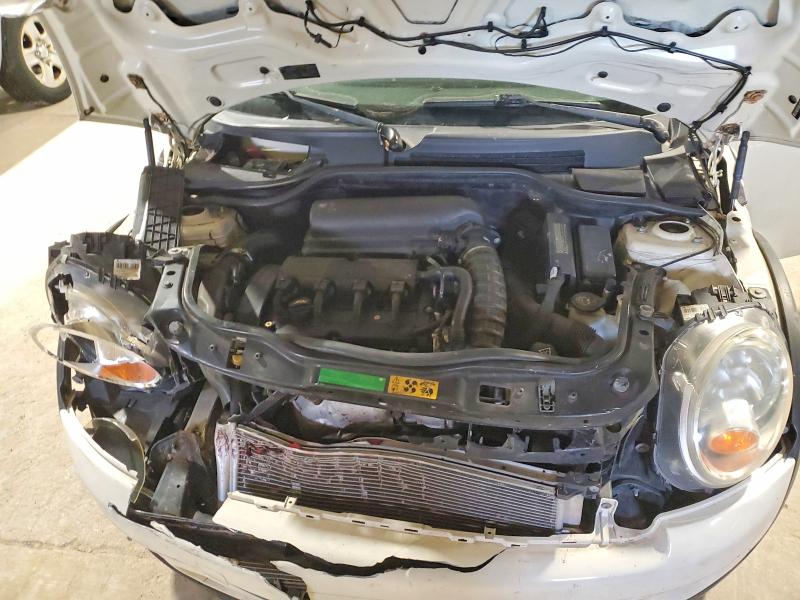 Photo 11 from auction – 2010 MINI COOPER S with VIN WMWMF7C56ATW88860