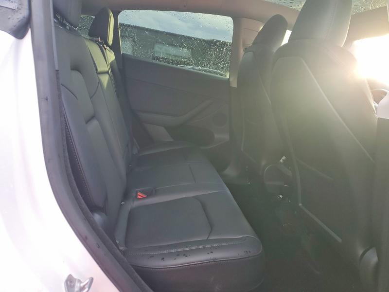 Photo 11 from auction – 2023 TESLA MODEL Y with VIN 7SAYGDEE1PF849966