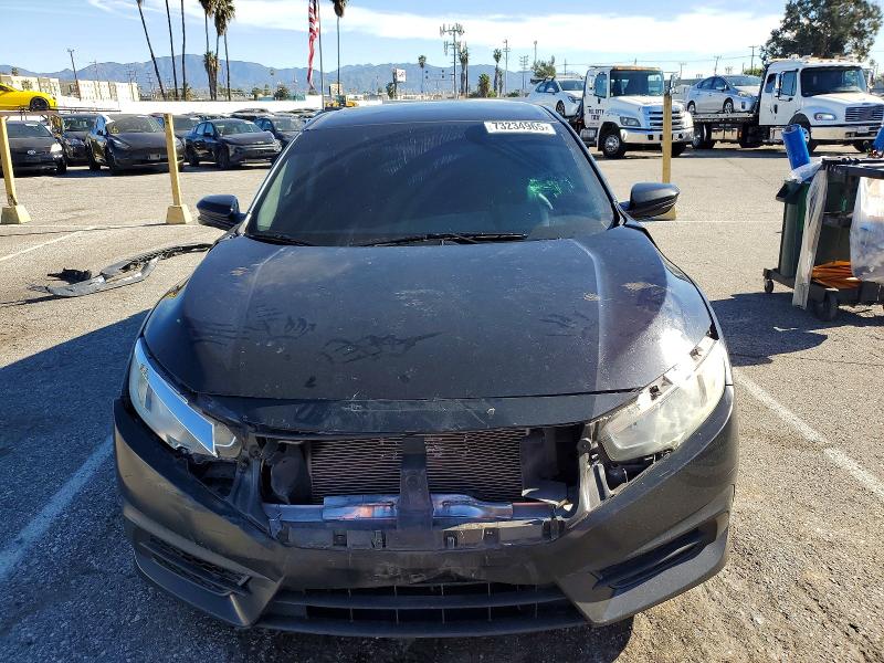 Photo 5 from auction – 2018 HONDA CIVIC EX with VIN 2HGFC2F78JH528000