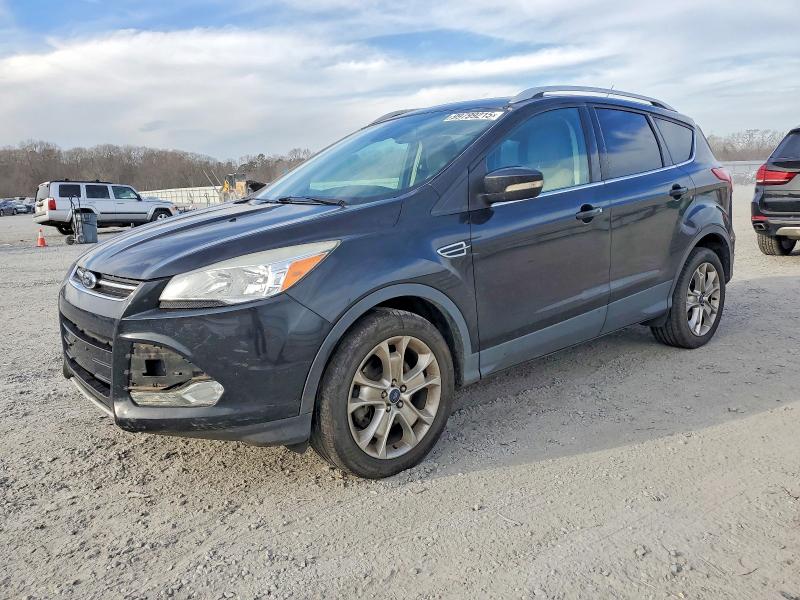 FORD ESCAPE TIT 2014 with VIN 1FMCU9JX9EUB19923 - Photo from auction