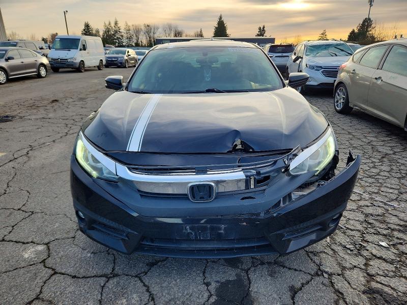 Photo 5 from auction – 2017 HONDA CIVIC EX with VIN 2HGFC1F31HH647086