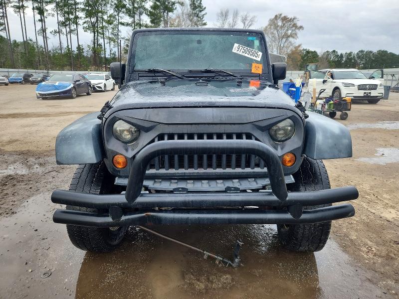 Photo 5 from auction – 2009 JEEP WRANGLER U with VIN 1J4GA39159L752503