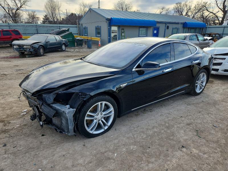 TESLA MODEL S 2014 with VIN 5YJSA1S11EFP62117 - Photo from auction