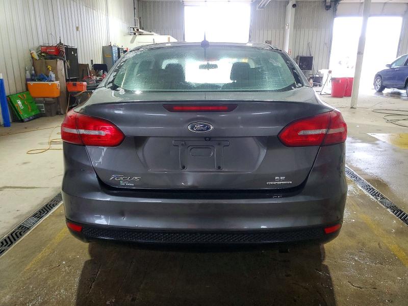 Photo 6 from auction – 2015 FORD FOCUS SE with VIN 1FADP3F23FL207731