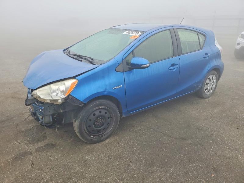 TOYOTA PRIUS C 2014 with VIN JTDKDTB33E1081745 - Photo from auction
