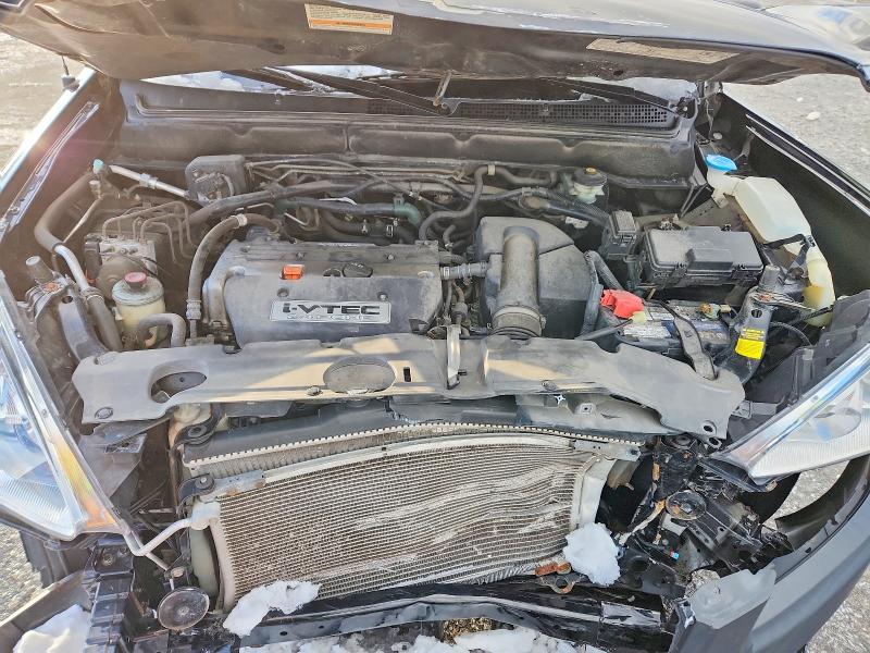 Photo 11 from auction – 2005 HONDA CR-V LX with VIN JHLRD78565C002249