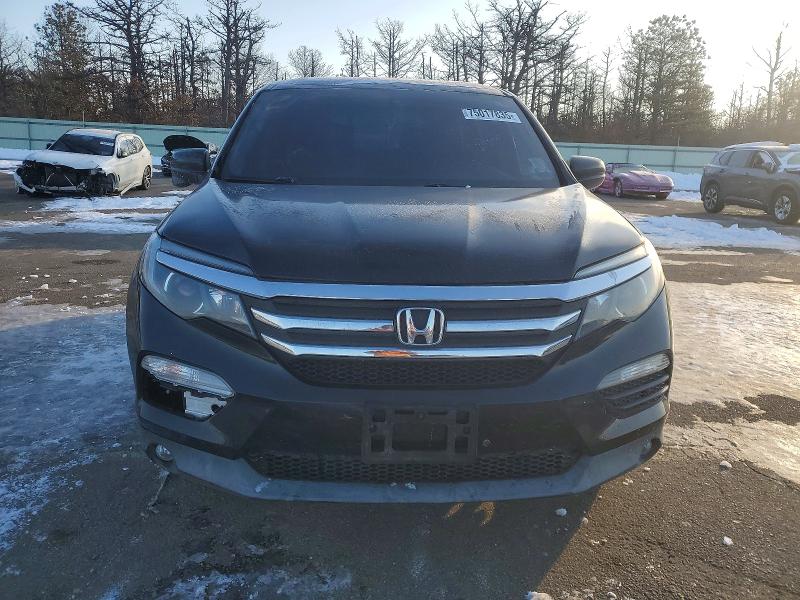 Photo 5 from auction – 2016 HONDA PILOT EXLN with VIN 5FNYF6H72GB086686