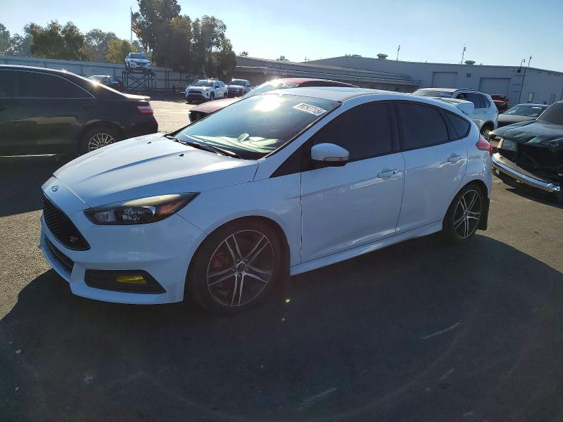 FORD FOCUS ST 2017 with VIN 1FADP3L95HL314493 - Photo from auction