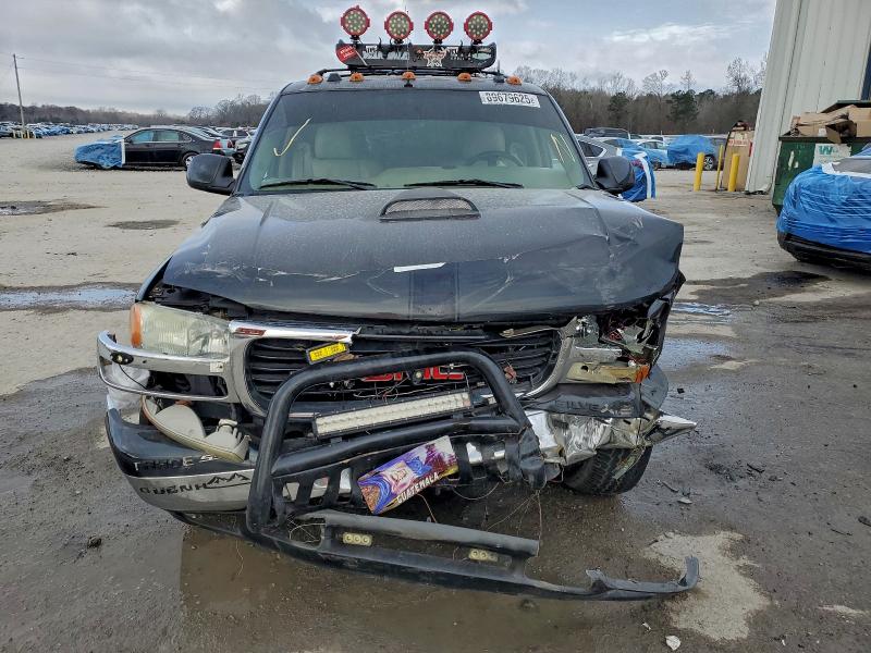 Photo 5 from auction – 2004 GMC YUKON with VIN 1GKEC13Z84R155284