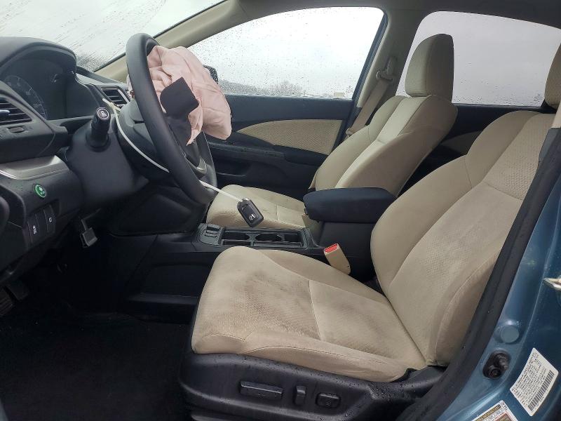 Photo 7 from auction – 2016 HONDA CR-V with VIN 2HKRM3H54GH515142