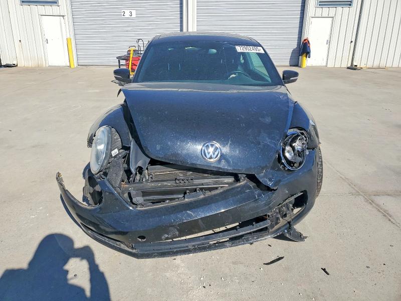 Photo 5 from auction – 2013 VOLKSWAGEN BEETLE with VIN 3VWJP7AT4DM690255