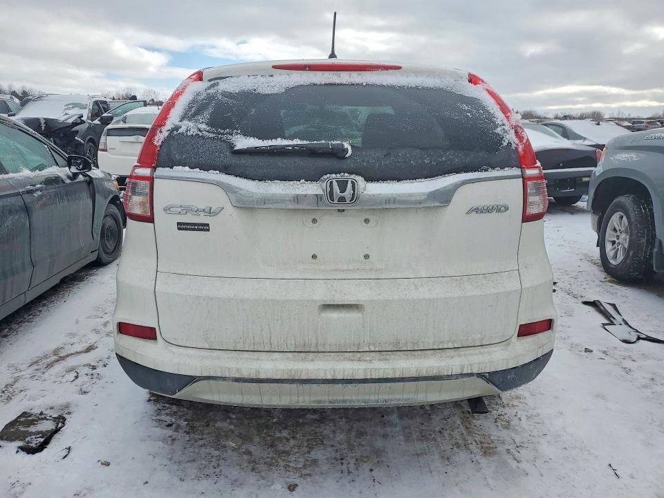 Photo 6 from auction – 2015 HONDA CR-V EX with VIN 5J6RM4H58FL090938