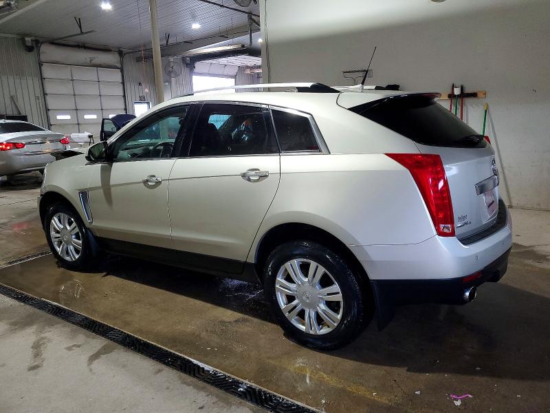 Photo 2 from auction – 2014 CADILLAC SRX LUXURY with VIN 3GYFNEE31ES657010