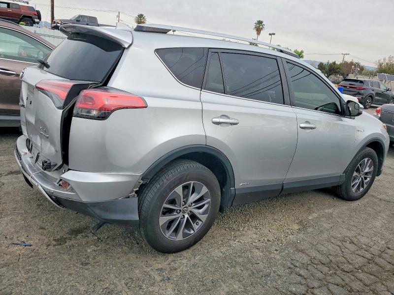 Photo 3 from auction – 2016 TOYOTA RAV4 HV with VIN JTMRJREV5GD006957