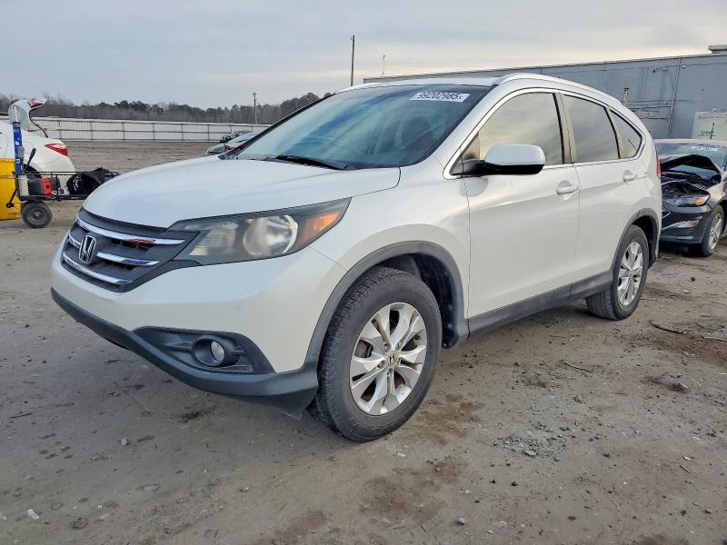 HONDA CR-V 2014 with VIN 5J6RM3H76EL001359 - Photo from auction