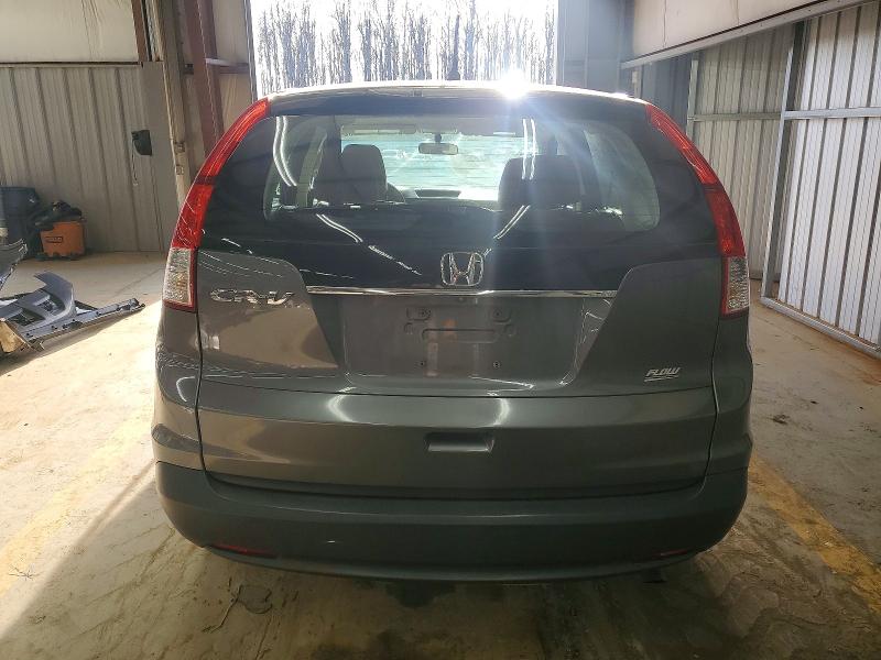 Photo 6 from auction – 2014 HONDA CR-V LX with VIN 3CZRM3H3XEG711293