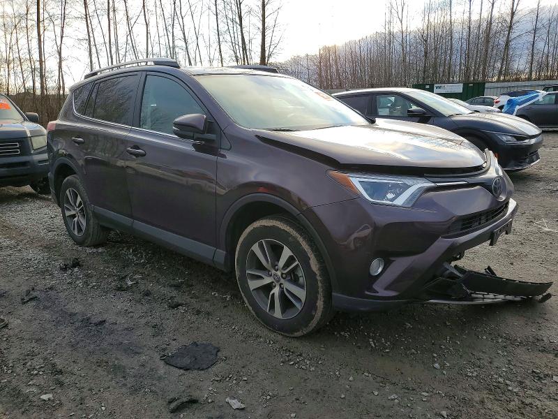 Photo 4 from auction – 2018 TOYOTA RAV4 with VIN 2T3RFREV3JW856842