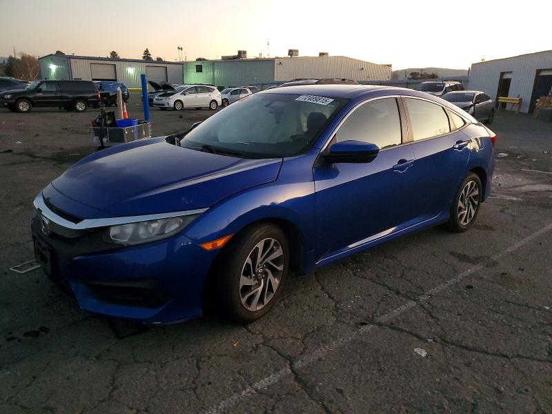 HONDA CIVIC 2018 with VIN 19XFC2F71JE205241 - Photo from auction