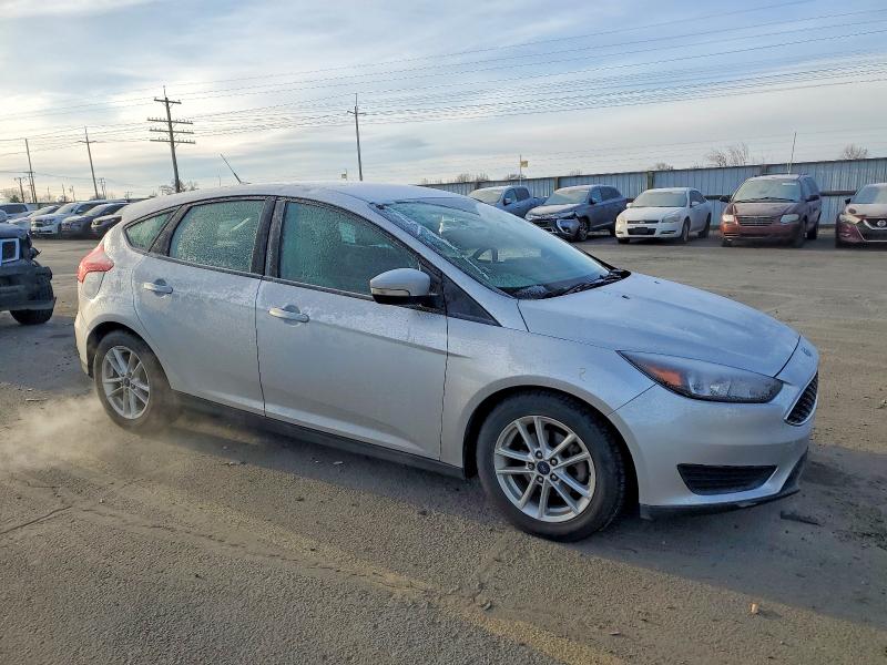 Foto 4 de la subasta – 2017 FORD FOCUS SE con VIN 1FADP3K23HL210766