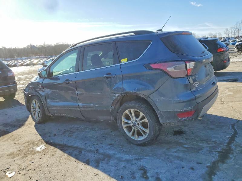 Photo 2 from auction – 2018 FORD ESCAPE SE with VIN 1FMCU9GD6JUB03198