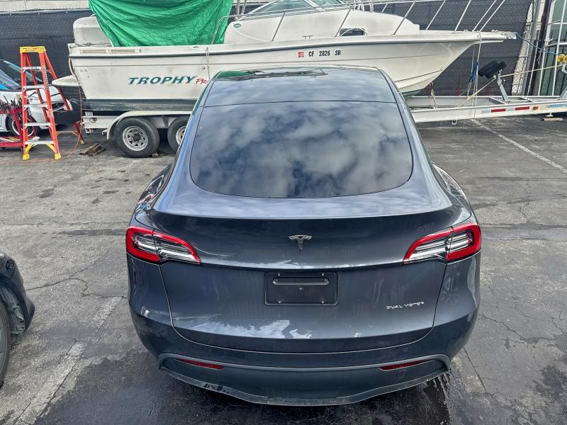 Photo 11 from auction – 2023 TESLA MODEL Y with VIN 7SAYGDEE2PA130691