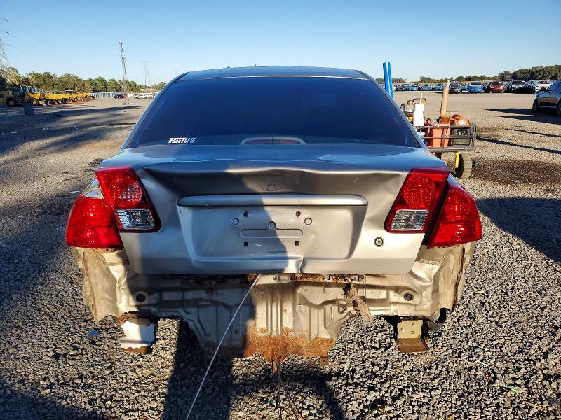 Photo 6 from auction – 2004 HONDA CIVIC LX with VIN 2HGES16544H606901
