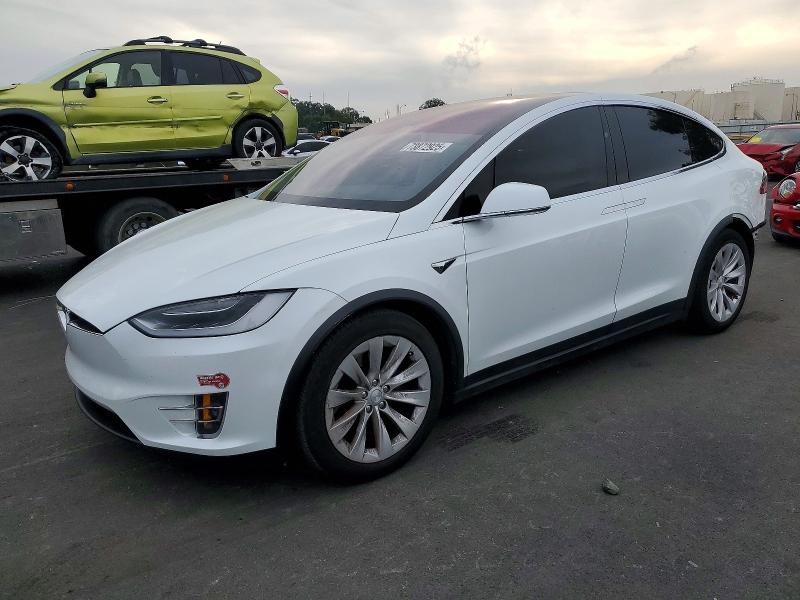 TESLA MODEL X 2018 with VIN 5YJXCAE20JF113973 - Photo from auction