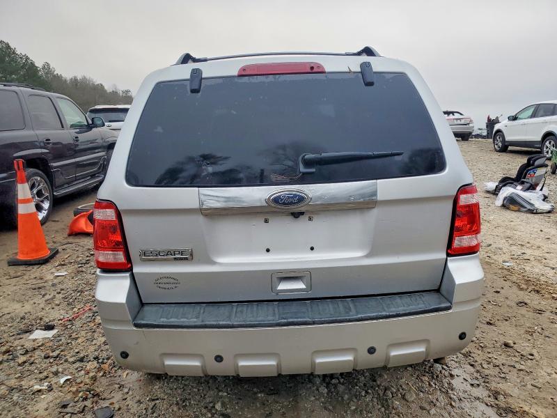 Photo 6 from auction – 2010 FORD ESCAPE LIM with VIN 1FMCU0E74AKC68638