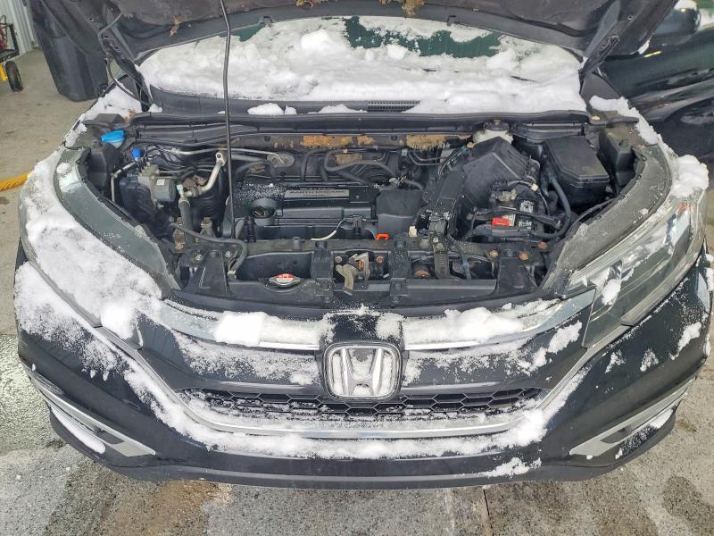 Photo 12 from auction – 2015 HONDA CR-V EXL with VIN 2HKRM4H77FH621526