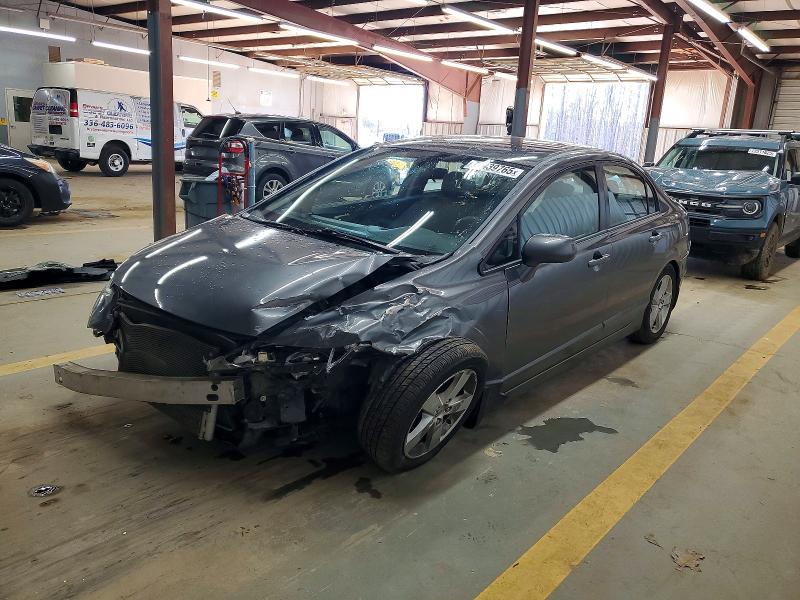 HONDA CIVIC 2010 with VIN 2HGFA1F64AH570459 - Photo from auction
