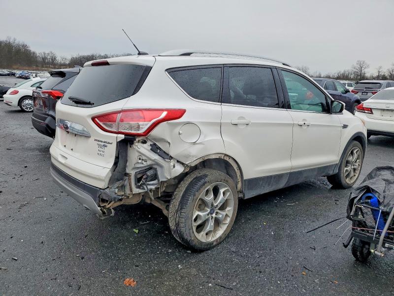 Photo 3 from auction – 2016 FORD ESCAPE TIT with VIN 1FMCU9J94GUB18358