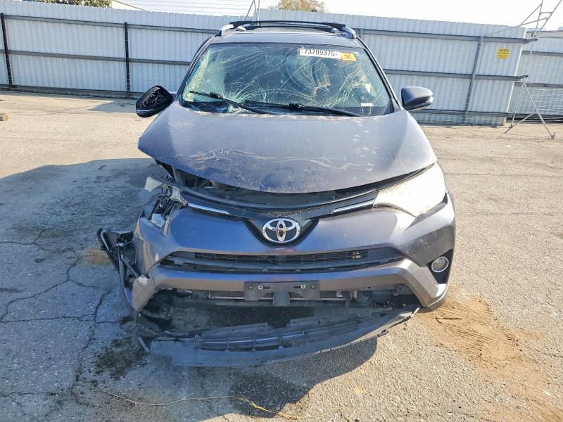 Photo 5 from auction – 2016 TOYOTA RAV4 with VIN JTMWFREV6GJ070057