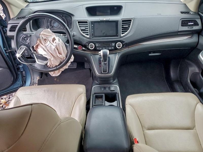 Photo 8 from auction – 2015 HONDA CR-V TOURI with VIN 5J6RM4H95FL087336