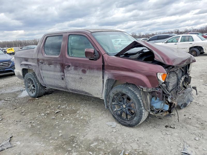 Photo 4 from auction – 2010 HONDA RIDGELINE with VIN 5FPYK1F58AB006645