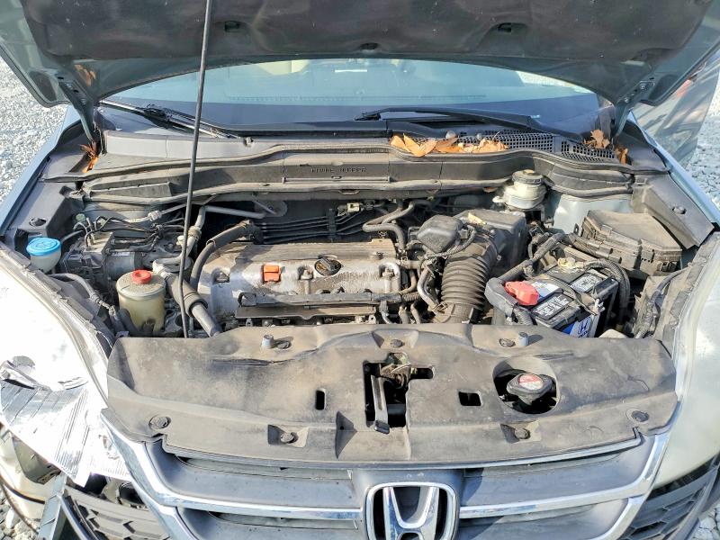 Photo 11 from auction – 2011 HONDA CR-V SE with VIN 5J6RE3H44BL056181