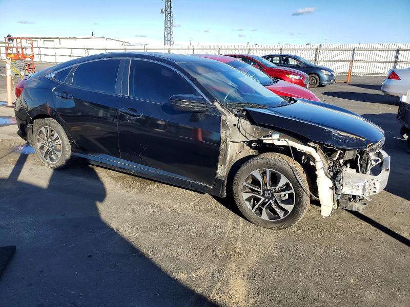 Photo 4 from auction – 2020 HONDA CIVIC LX with VIN 19XFC2F62LE209101