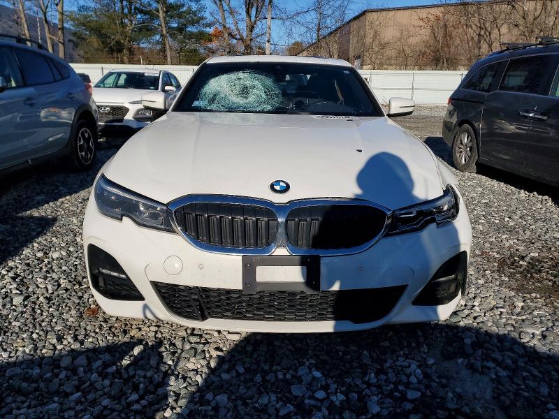 Photo 5 from auction – 2022 BMW 330XI with VIN 3MW5R7J08N8C27952