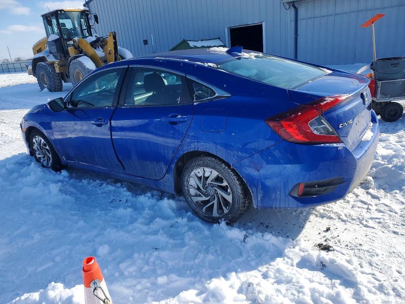 Photo 2 from auction – 2018 HONDA CIVIC EX with VIN 19XFC2F73JE044018
