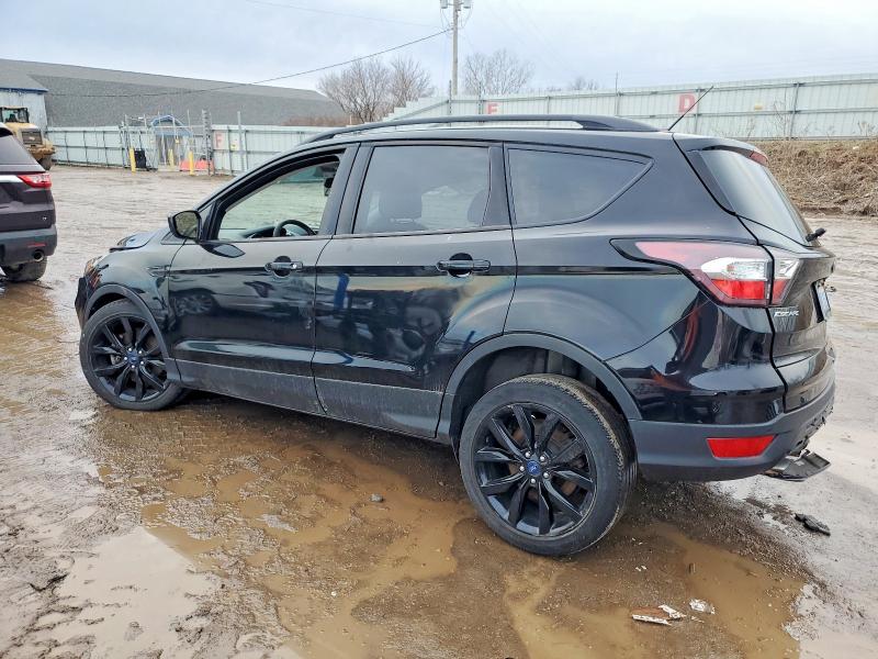 Photo 2 from auction – 2017 FORD ESCAPE with VIN 1FMCU9GD4HUE70661