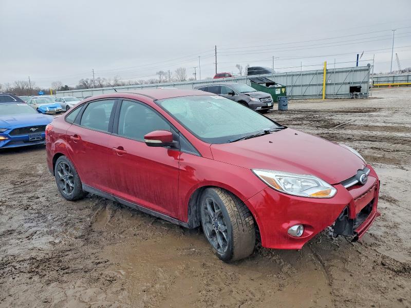 Photo 4 from auction – 2014 FORD FOCUS with VIN 1FADP3F27EL398889