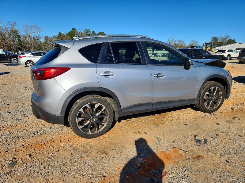 Photo 3 from auction – 2016 MAZDA CX-5 GT with VIN JM3KE4DYXG0715564
