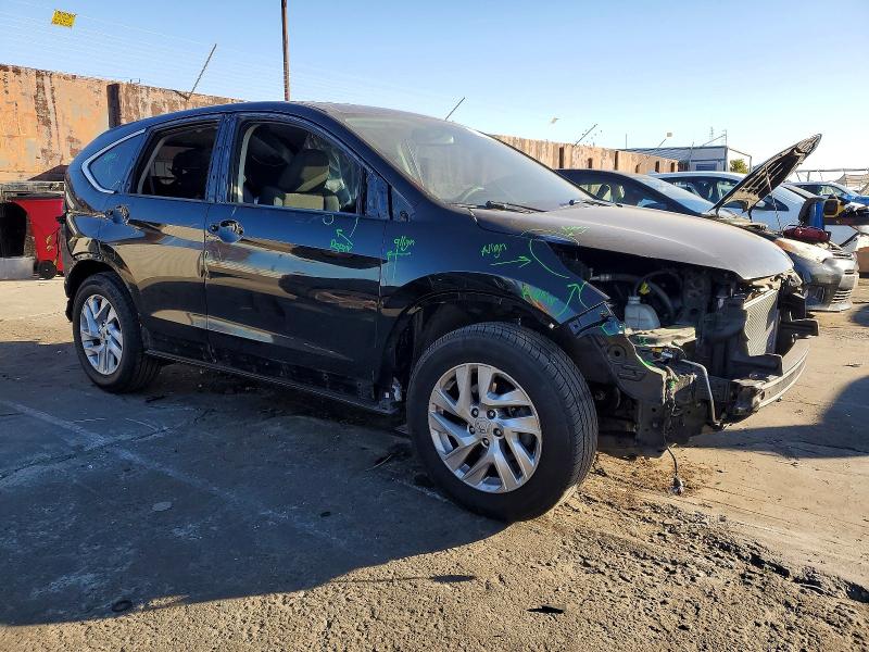 Photo 4 from auction – 2016 HONDA CR-V EX with VIN 2HKRM3H56GH564861