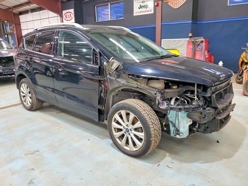 Photo 4 from auction – 2017 FORD ESCAPE TIT with VIN 1FMCU9JD9HUC30241