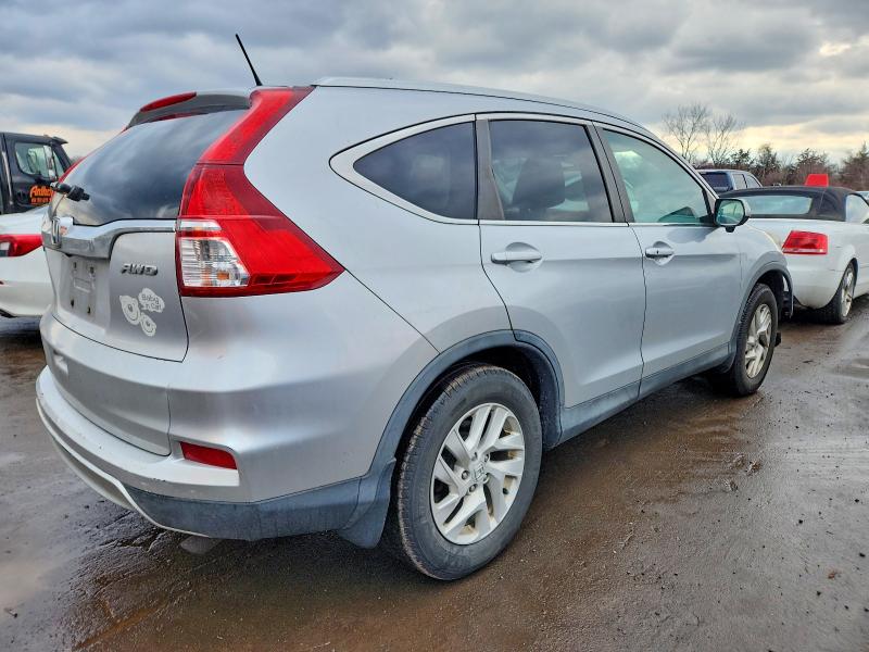 Photo 3 from auction – 2015 HONDA CR-V EXL with VIN 2HKRM4H79FH617395