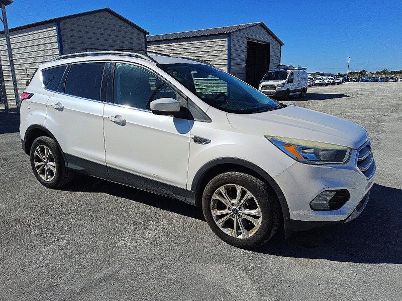 Photo 4 from auction – 2018 FORD ESCAPE with VIN 1FMCU9GD8JUA69328