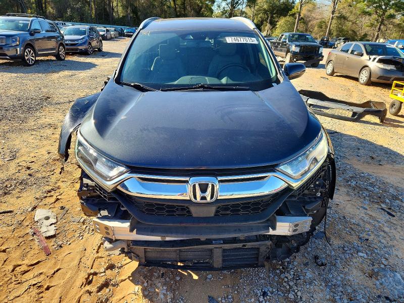 Photo 5 from auction – 2018 HONDA CR-V with VIN 7FARW1H98JE008711