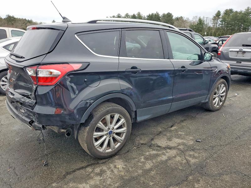 Photo 3 from auction – 2018 FORD ESCAPE TIT with VIN 1FMCU9J91JUD39973