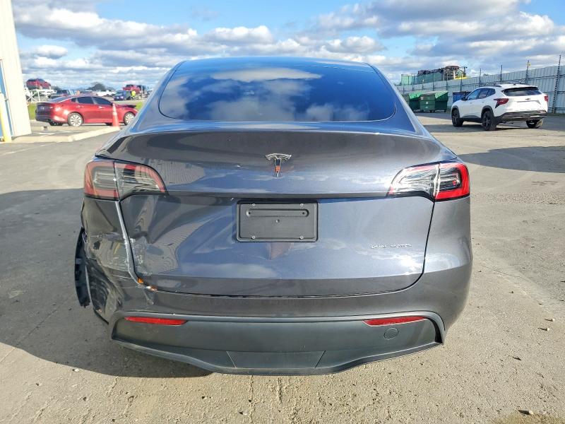 Photo 6 from auction – 2023 TESLA MODEL Y with VIN 7SAYGAEE4PF612385