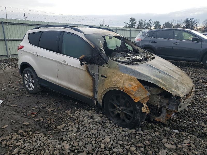 Photo 4 from auction – 2013 FORD ESCAPE with VIN 1FMCU0HX2DUA70080